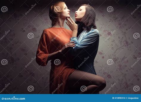 show me two women making love